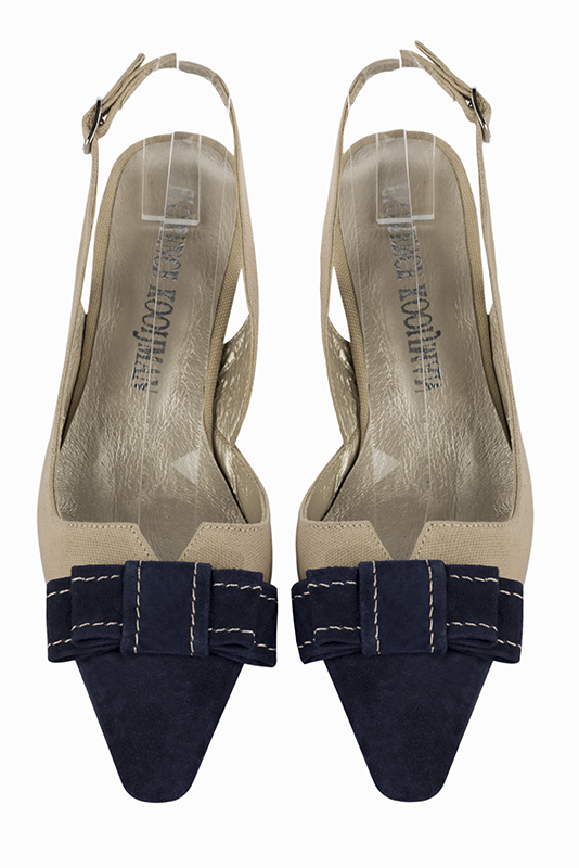 Navy blue and tan beige women's open back shoes, with a knot. Tapered toe. Medium spool heels. Top view - Florence KOOIJMAN